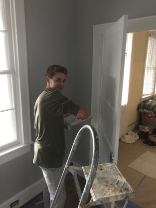 Ethan working on their bedroom 